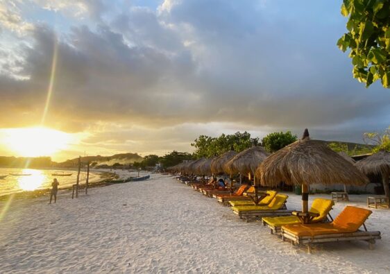 Sunset and beach loungers at Tanjung Aan Lombok