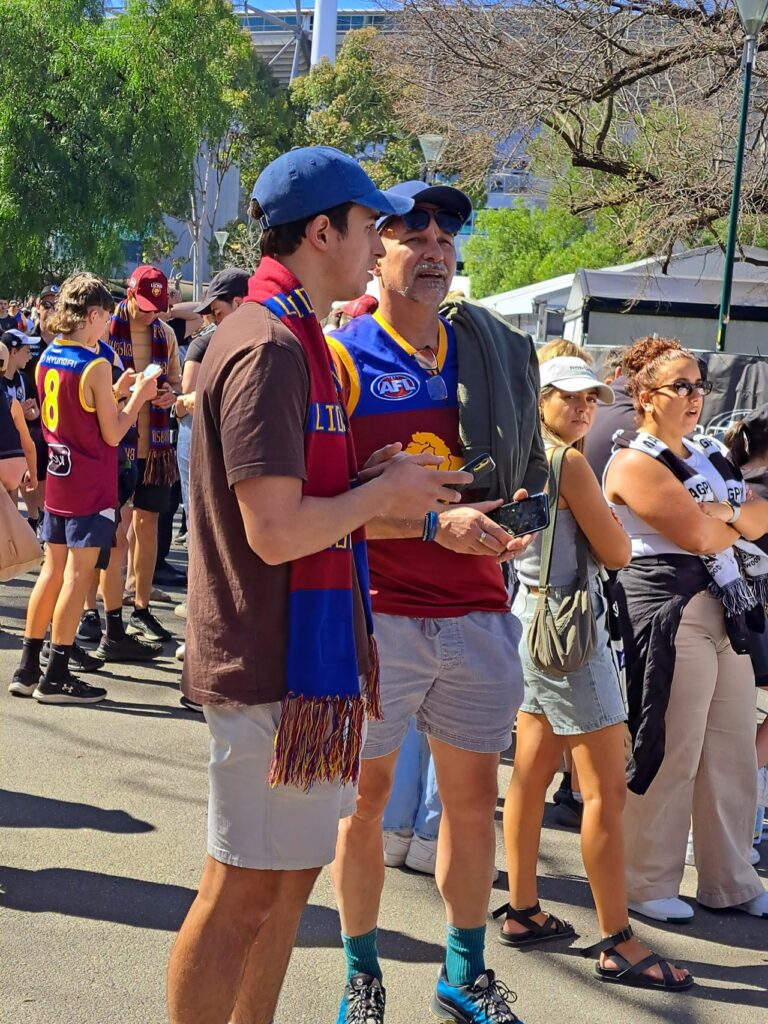 Praying at the AFL Altar at the the Grand Final Parade